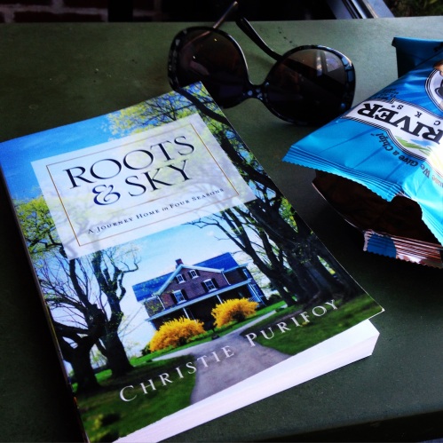 roots and sky book table sunglasses